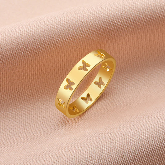 Elegant hollow butterfly ring in gold color, crafted from stainless steel. Features delicate butterfly cutouts, rust-resistant, and hypoallergenic.