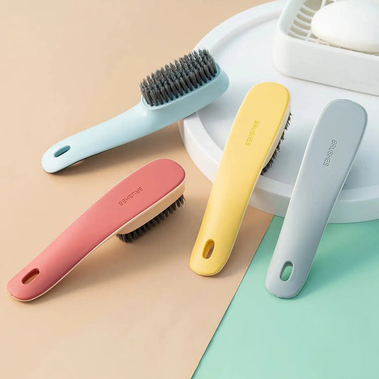 Multi-functional shoe cleaning brush with plastic handle in pastel colors, ideal for household and commercial use. Durable bristles for effective scrubbing.